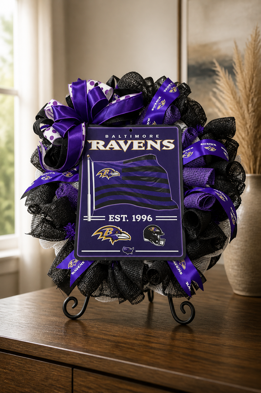 Baltimore Ravens wreath with decorative ribbons on a stand